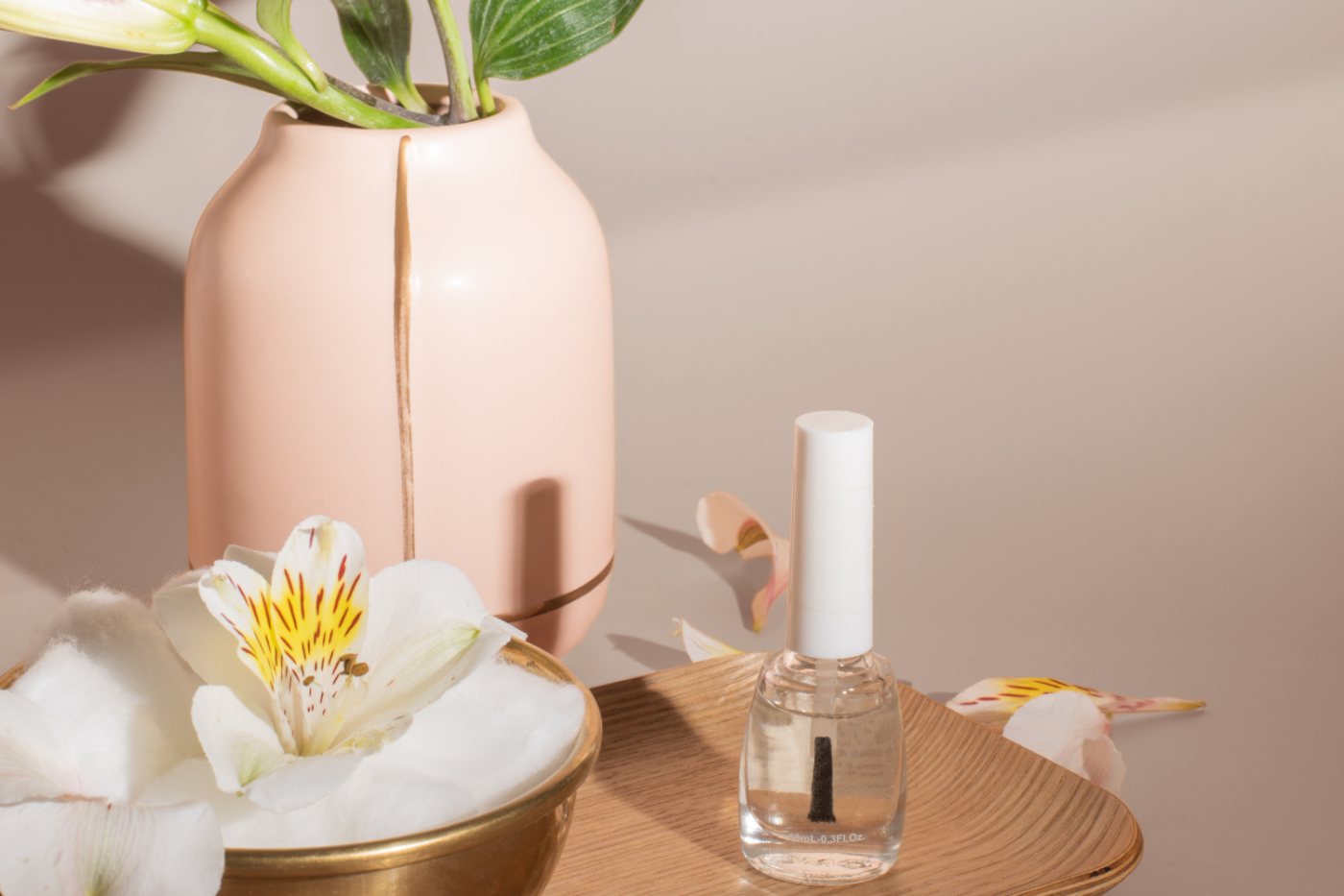 Woman looking tired surrounded by beauty and self-care products